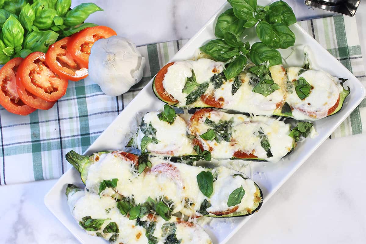 Plated zucchini boats with ingredients