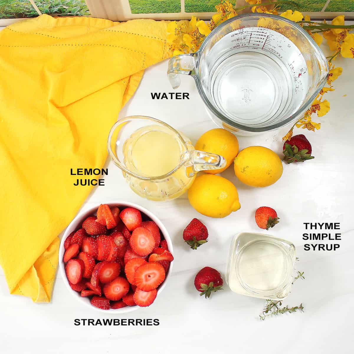 Ingredients for homemade strawberry lemonade.