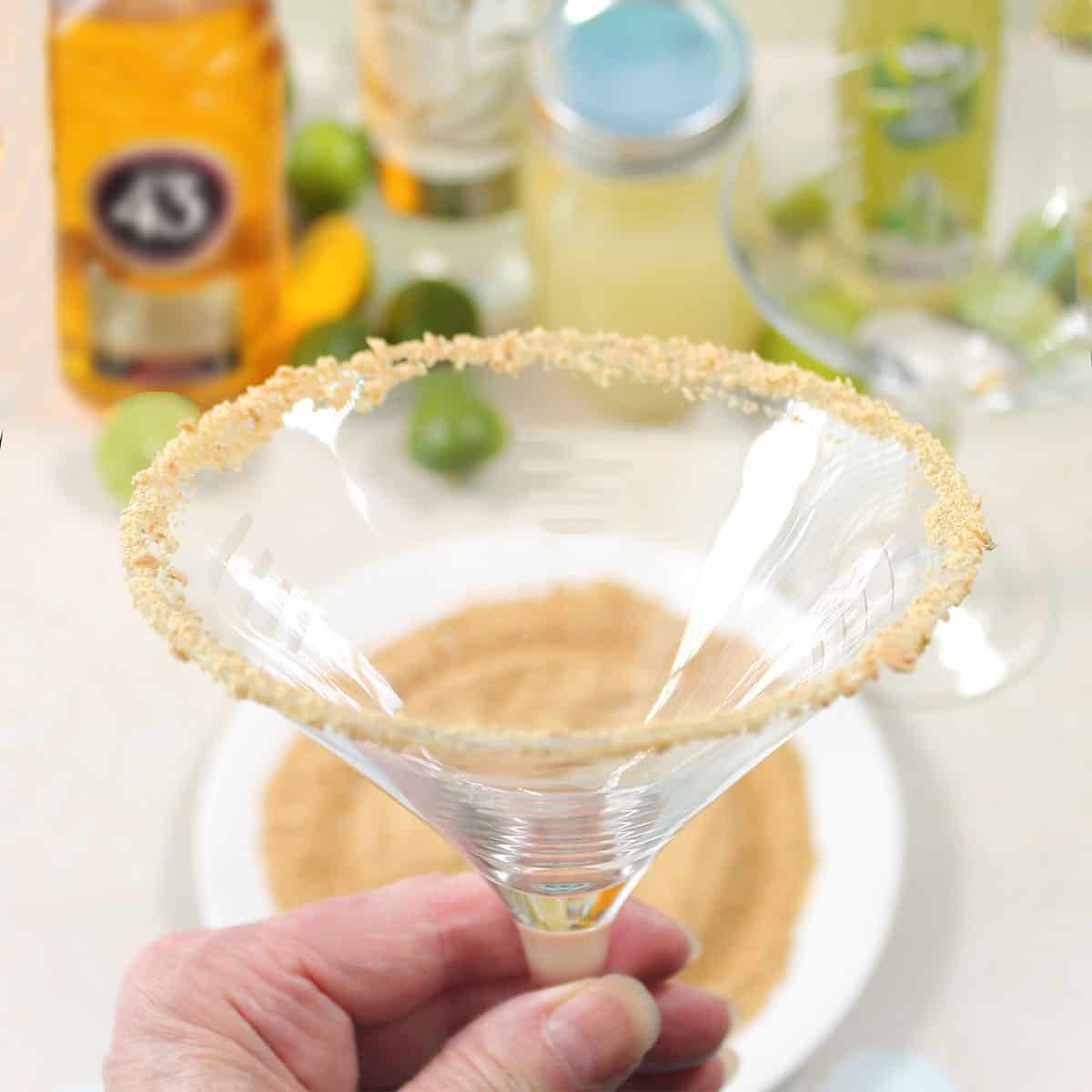 Martini glass with graham cracker rim.