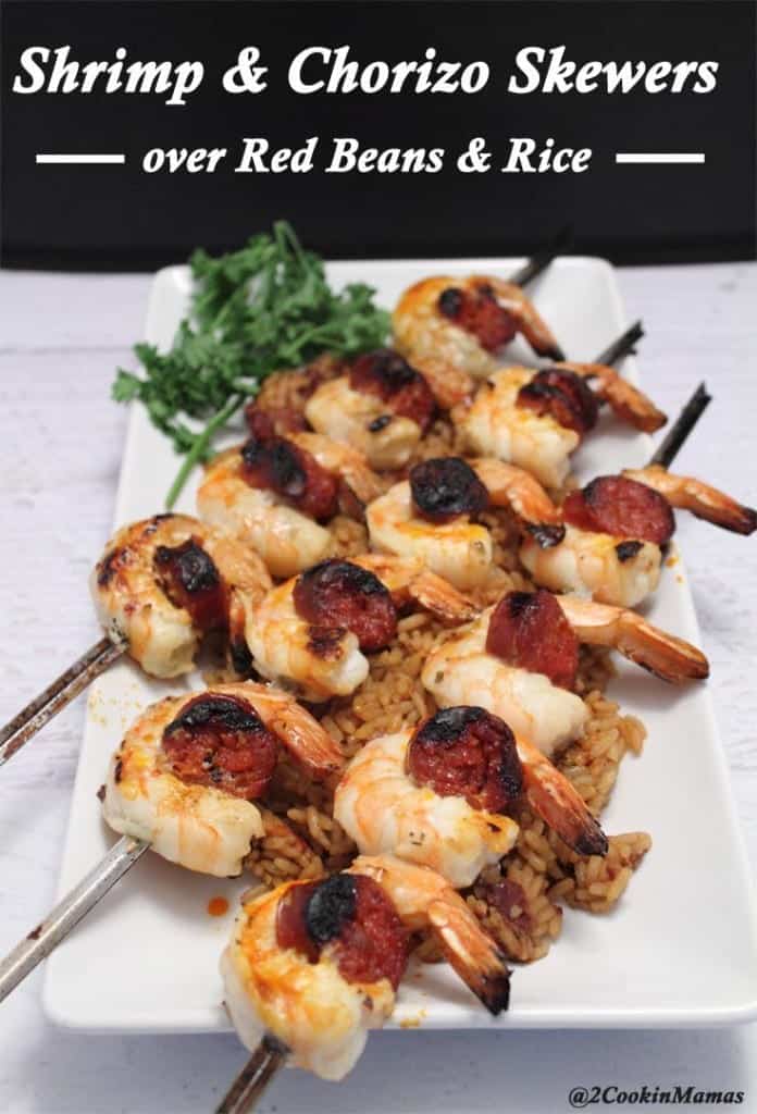 Closeup of Shrimp & Chorizo Skewers on white platter. 