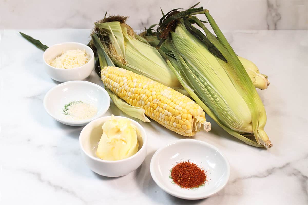 Ingredients for Grilled Corn with Parmesan Chili Butter.