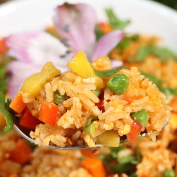 Spoonful of tropical fried rice.