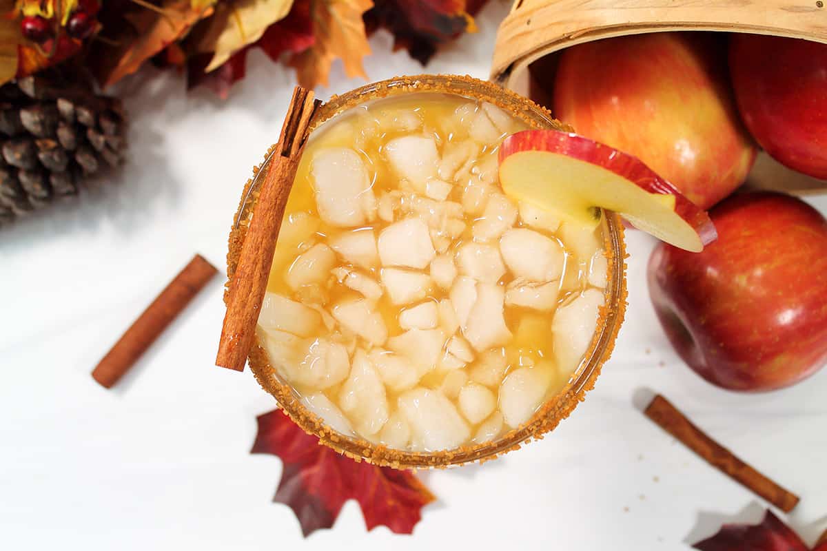 Overhead of single apple cider cocktail.