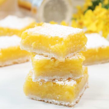 Stack of lemon dessert bars.