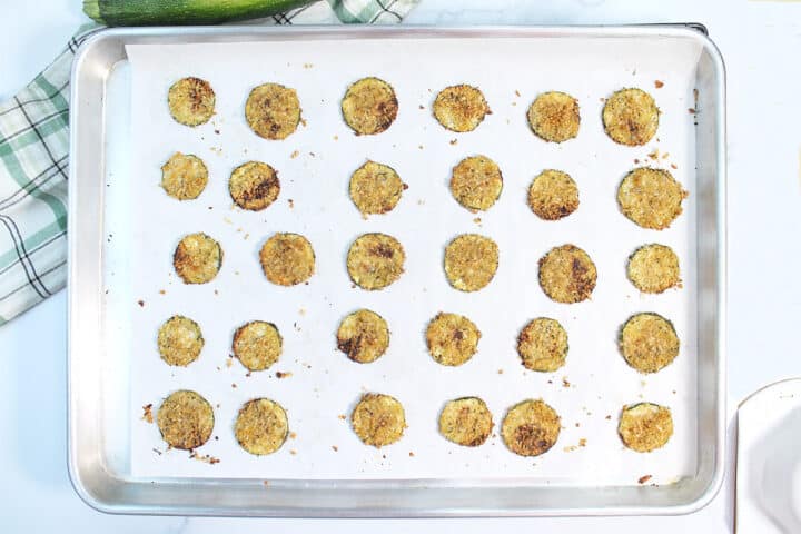 Overhead of baked chips on cookie sheet.