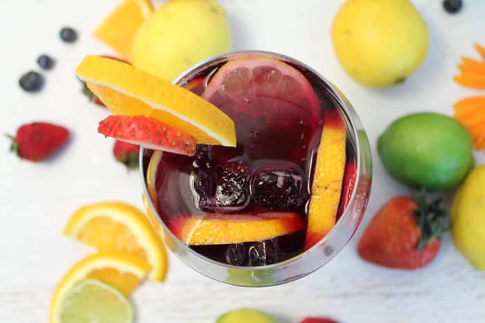 https://2cookinmamas.com/wp-content/uploads/2014/05/Sangria-serving-overhead.jpg