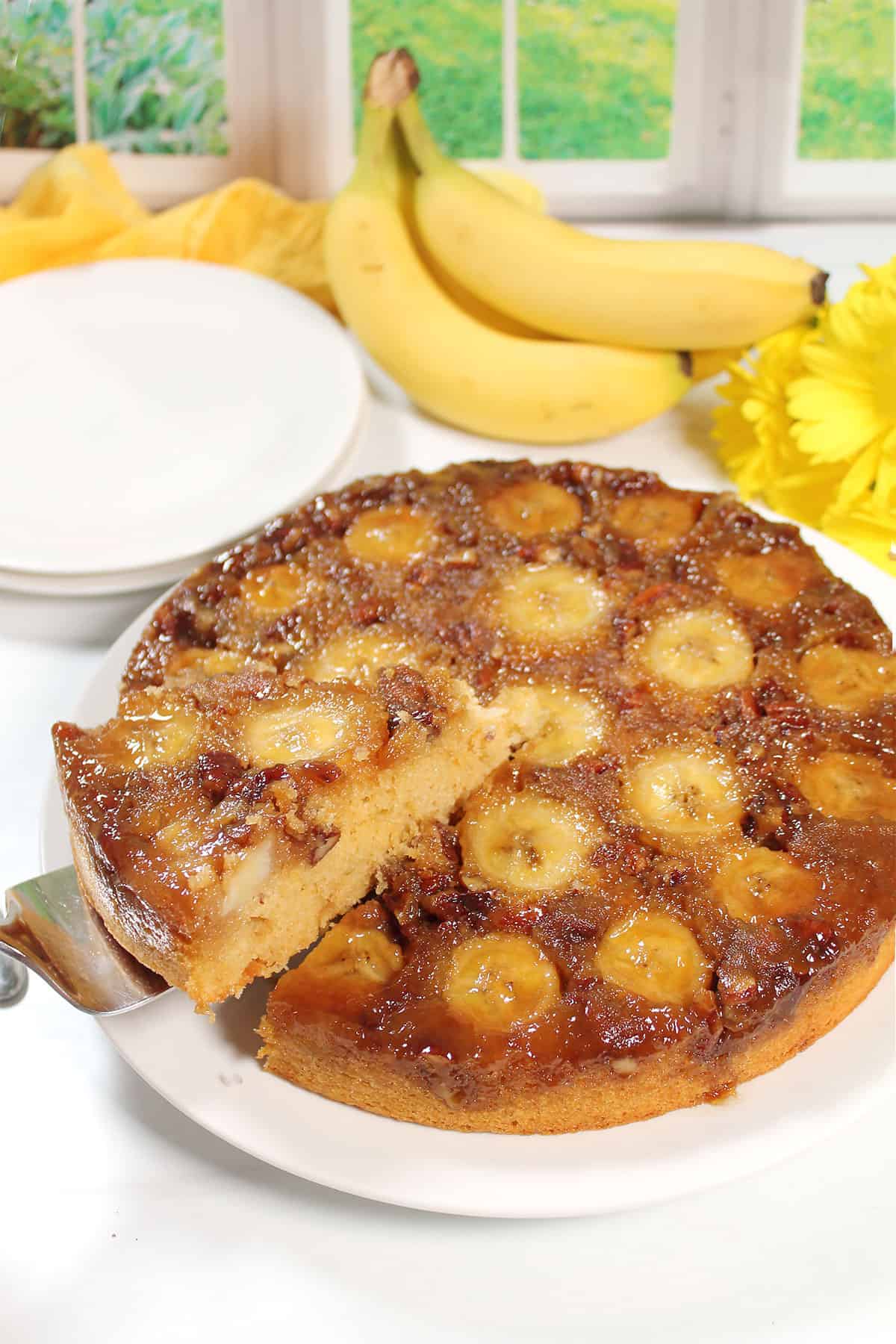 Lifting slice from bananas foster upside down cake.