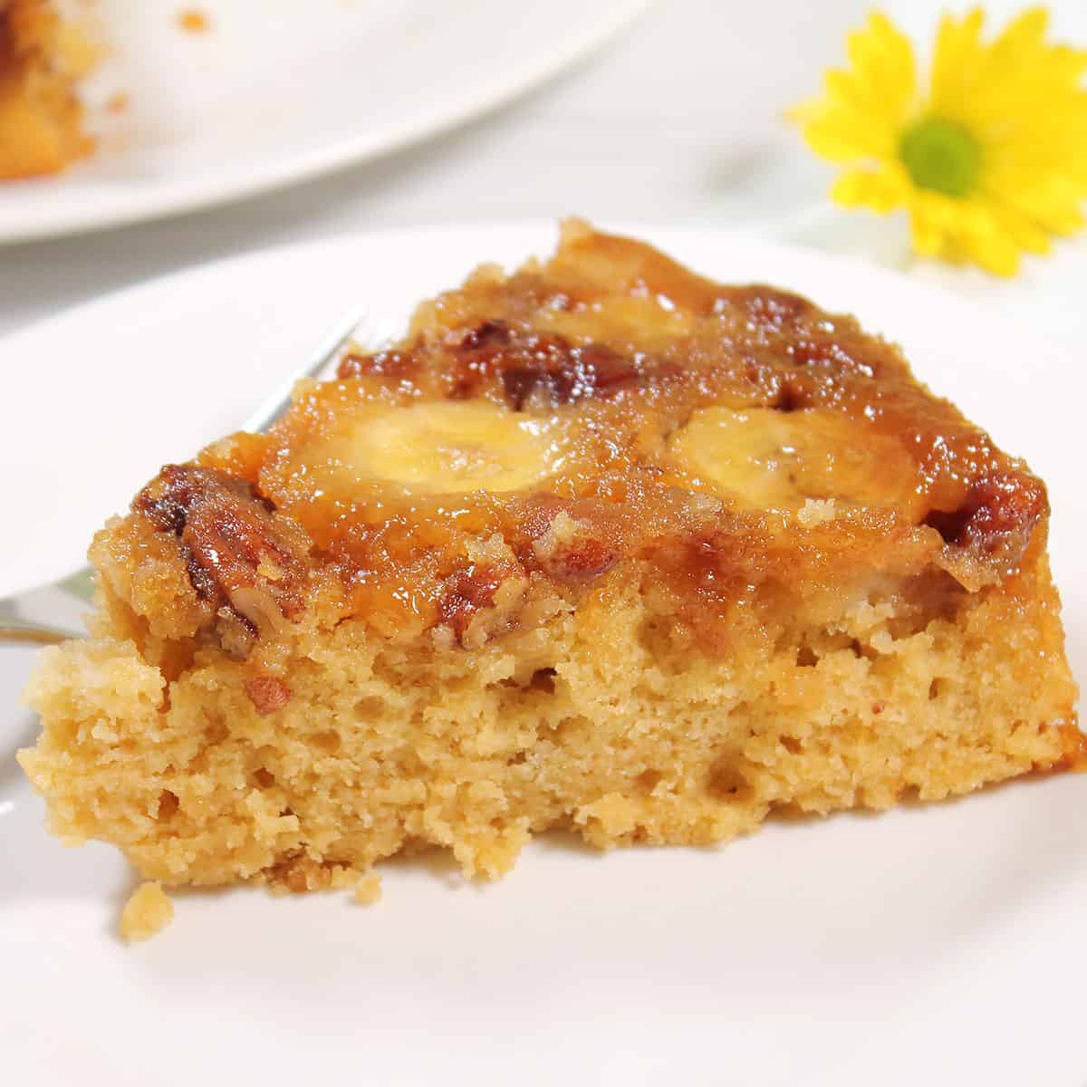 Slice of upside down banana caramel cake.