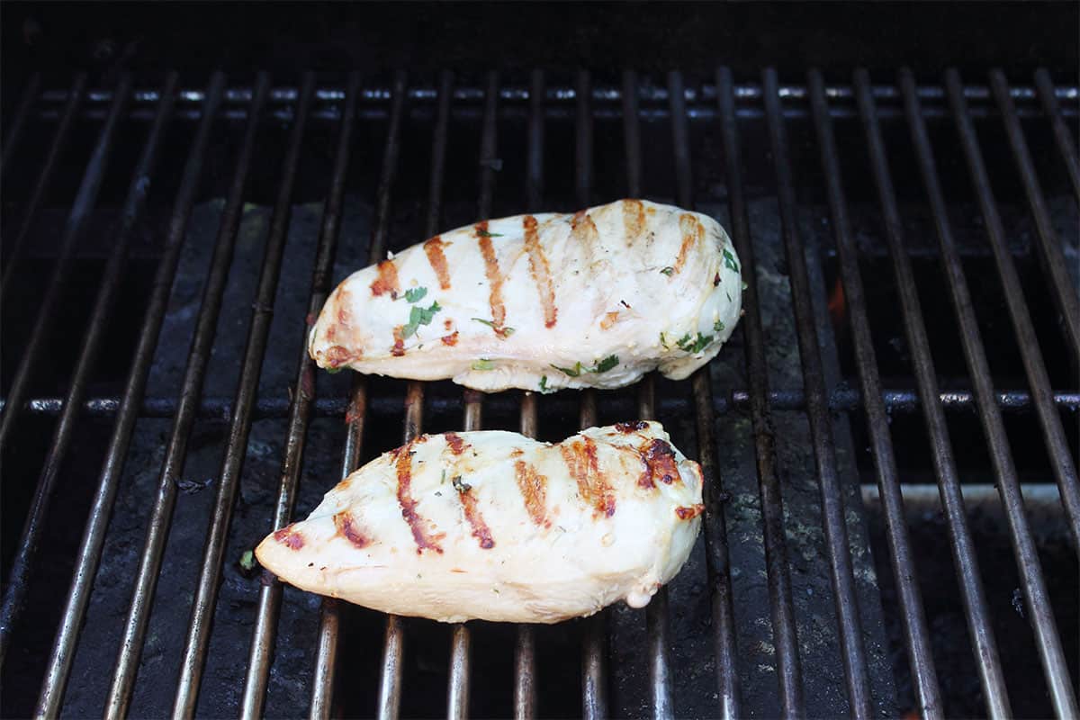 Grilling chicken breasts.