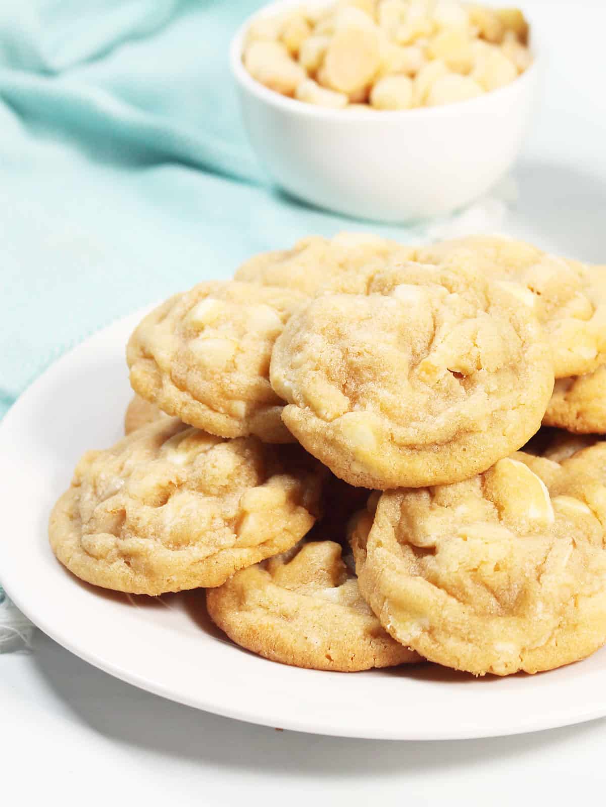 Plateful of white chocolate cookies with macadamia nuts.