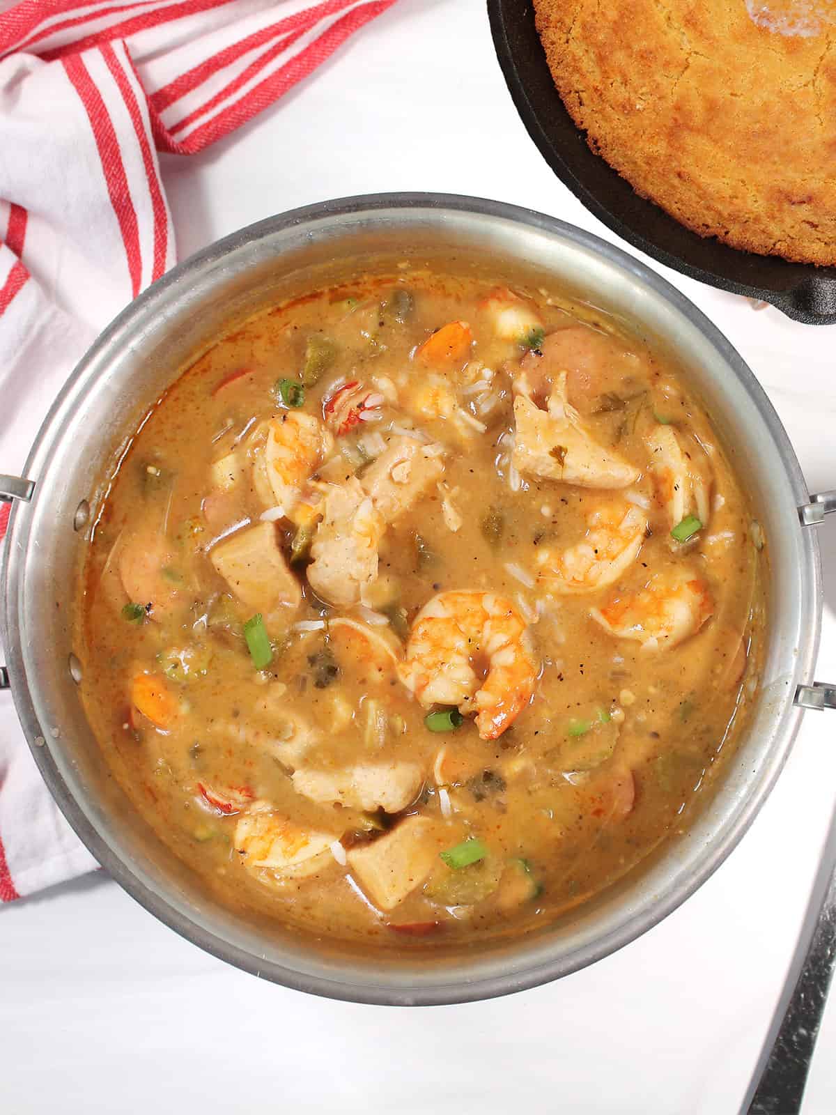Finished chicken and seafood gumbo in stock pot.