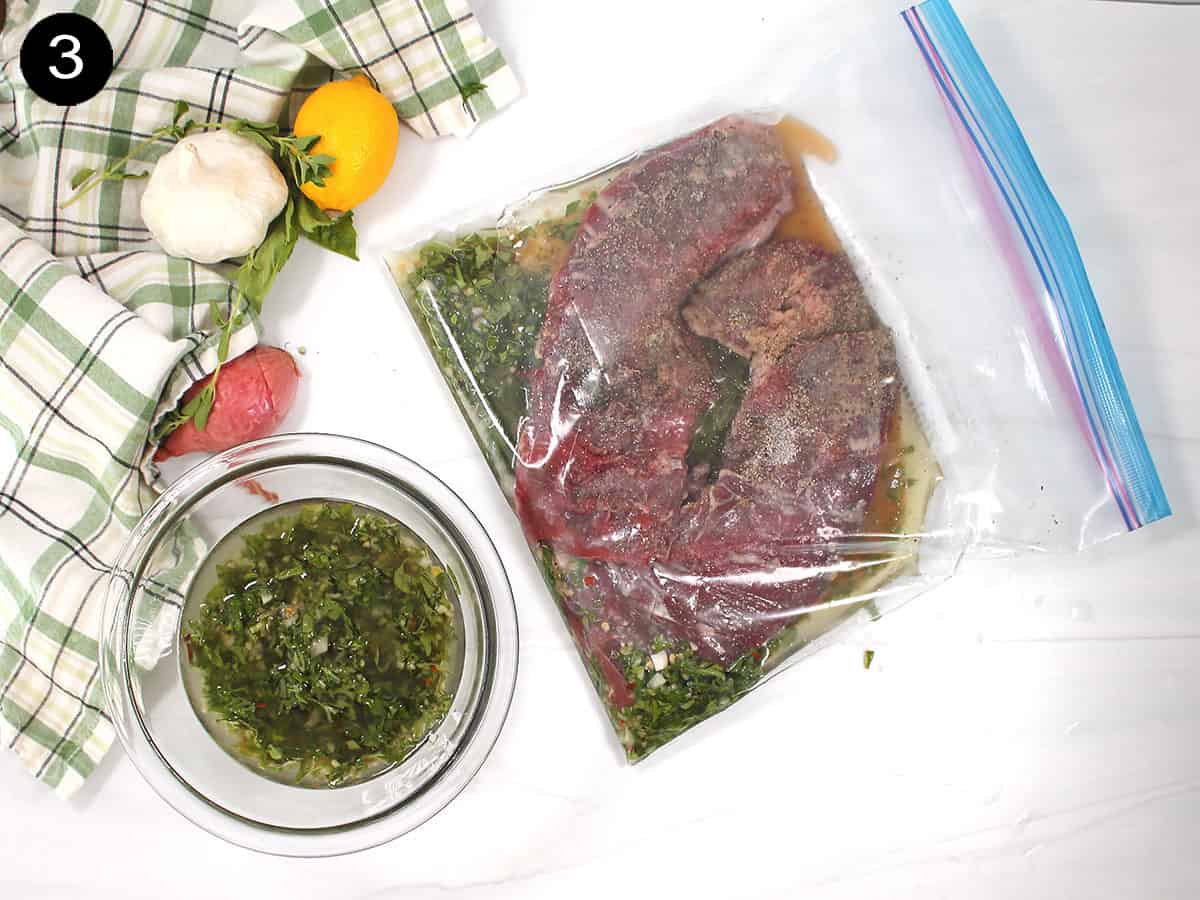 Steak in chimichurri marinade.