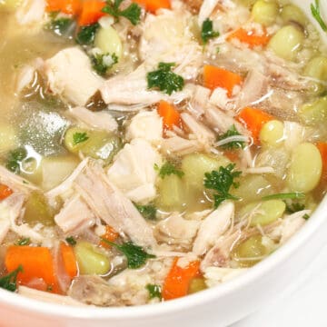 Closeup of soup ingredients in bowl.