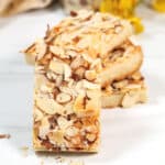 Stacked bar cookies with one in front.