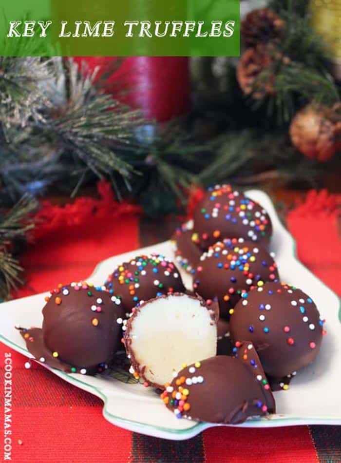 Key Lime Truffles | 2 Cookin Mamas Easy and temptingly delicious key lime flavored truffles are a delicious addition to any holiday gathering. Key lime flavored cookies and cream cheese centers are dipped into dark chocolate for a holiday version of key lime pie on a stick. #recipe