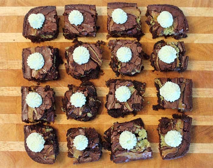 Key Lime Cheesecake Brownies individually frosted