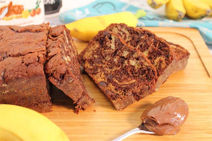 Nutella Banana Bread sliced on cutting board