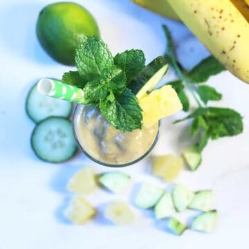 Overhead of garnished pineapple smoothie.