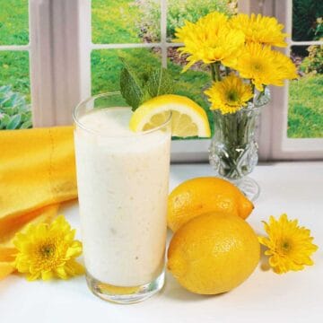 Lemon Smoothie by garden window with lemons.