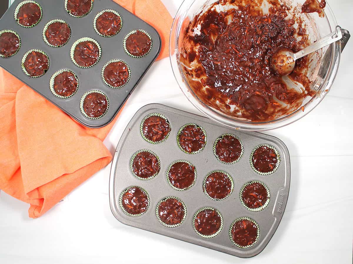 Batter filled cupcake tin ready for oven.