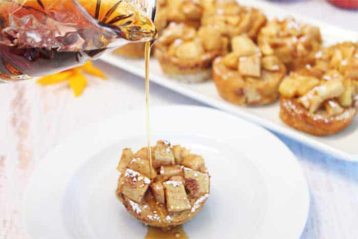 Apple French Toast Muffins pouring syrup