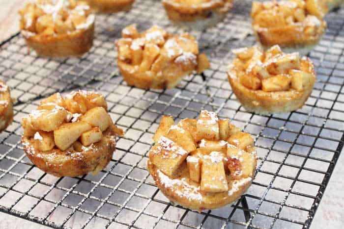 Apple French Toast Muffins cooling on rack