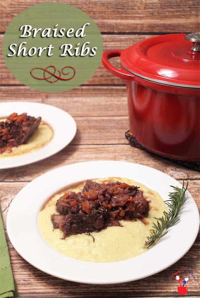 Braised Beef Short Ribs main | 2 Cookin Mamas These fall-off-the-bone, tender Beef Short Ribs, cooked in a Dutch Oven, are simmered in a wine-beef broth that is perfect served over cheesy smoked Gouda polenta. #shortribs #beef #dinner #dutchoven #recipe #polenta