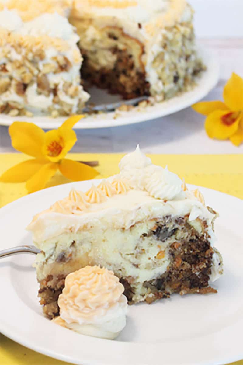 Cheesecake Factory Carrot Cake Cheesecake plated with cake.