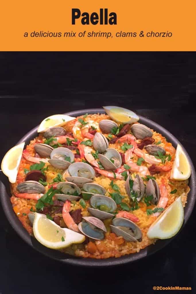Paella | 2CookinMamas A traditional Spanish dish filled with clams, shrimp, chorizo on a bed of rice. A one pot dish ready in 30 minutes.