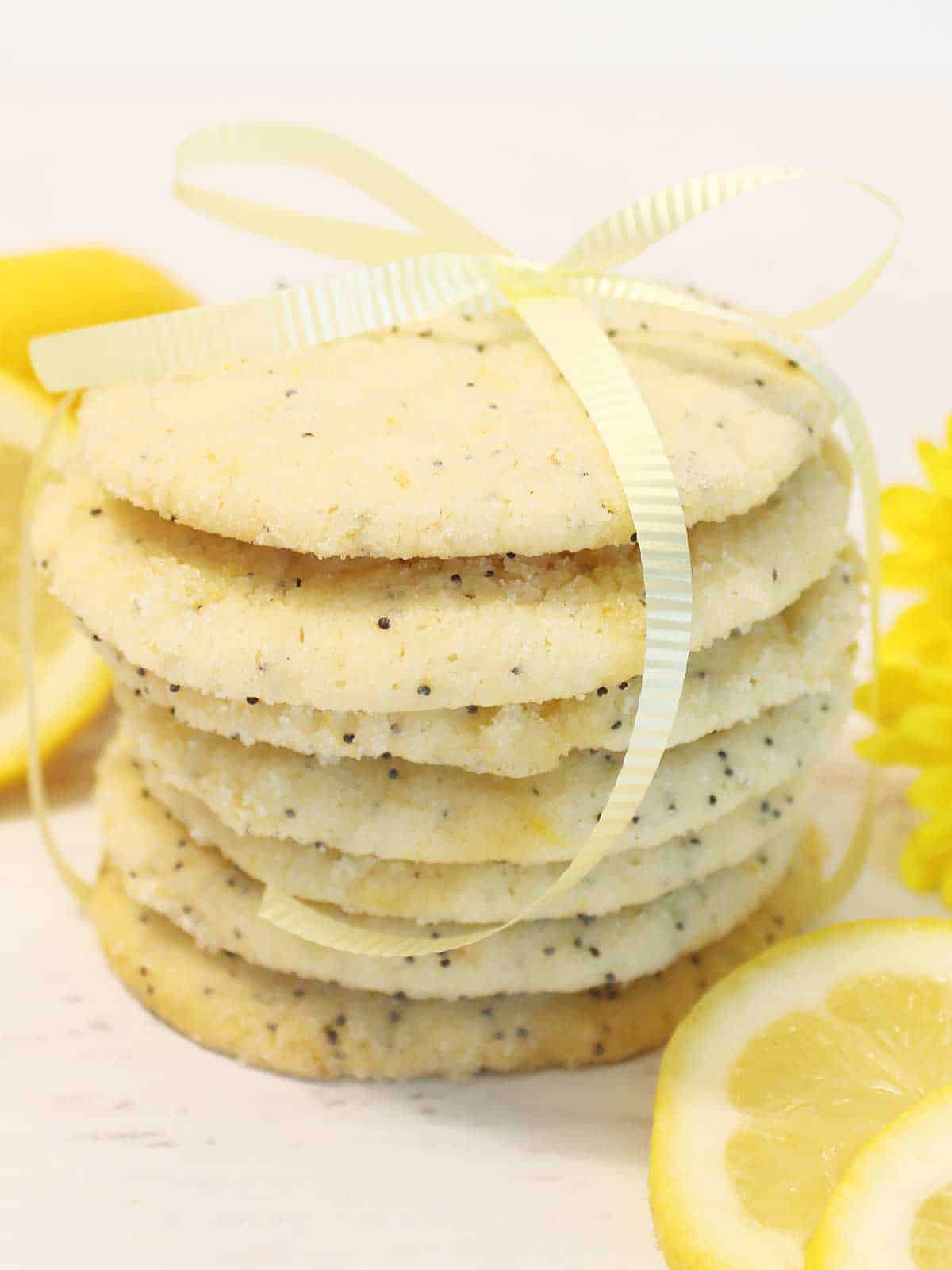 Stack of lemon cookies tied with ribbon.