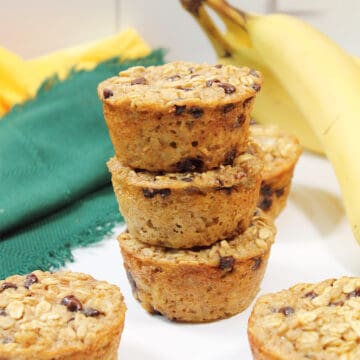 Stack of banana oat muffins with chocolate chips.