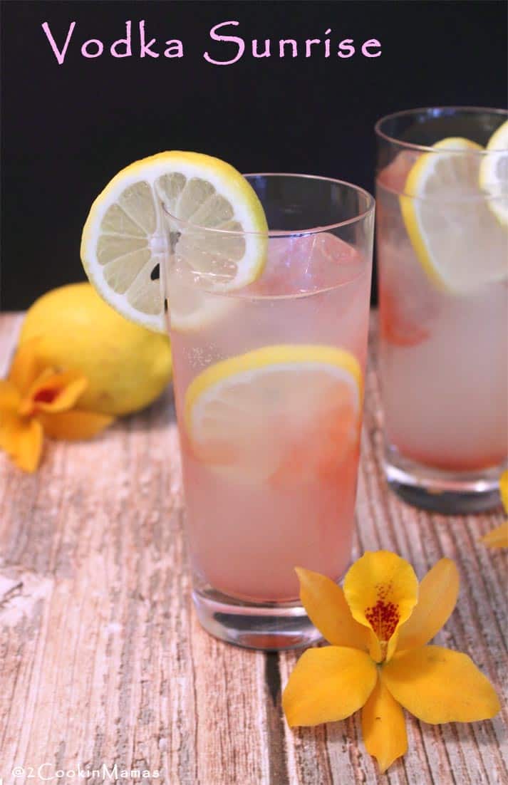 Vodka Sunrise | 2CookinMamas The perfect drink for warm summer days. A refreshing combination of lemon soda, coupled with vodka & a touch of cherry juice,, makes this one refreshing cocktail!