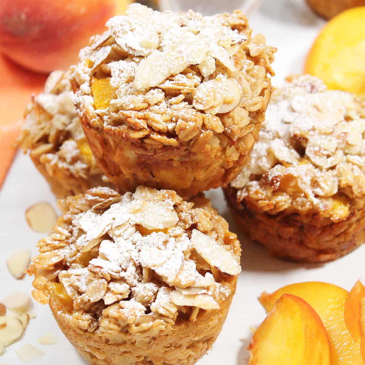 Stack of oatmeal muffins with almonds.