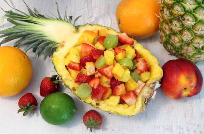 Fruit Cocktail Dessert pineapple bowl | 2 Cookin Mamas