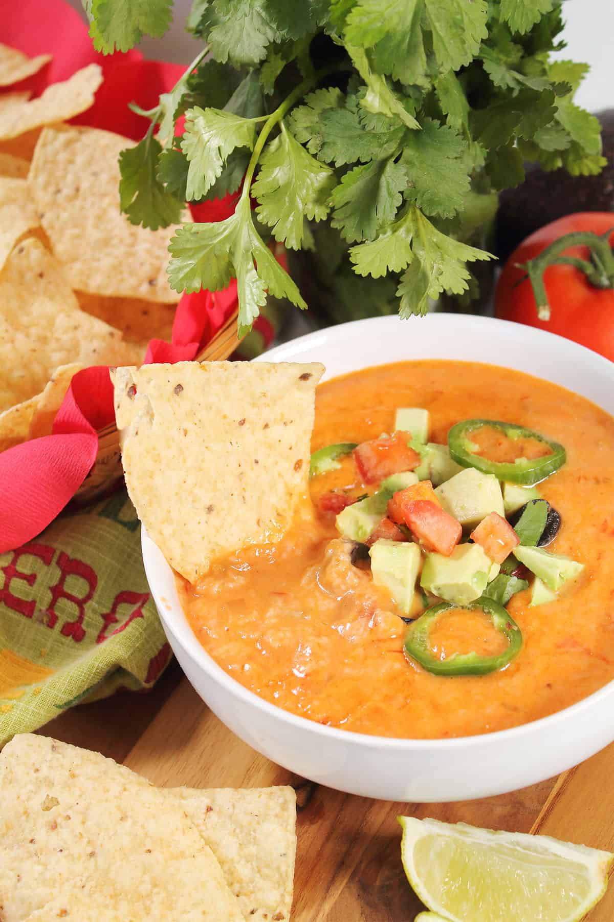 Spicy Queso Cheese Dip with chips and ready to serve.