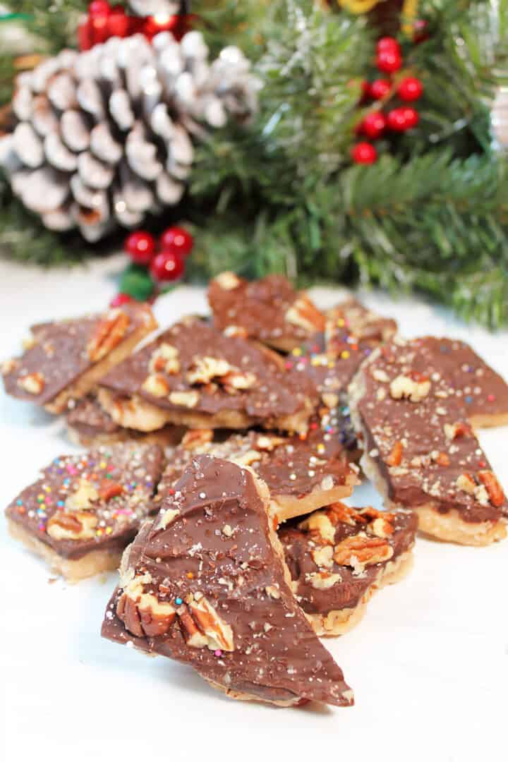 Scattered finished toffee on white table.