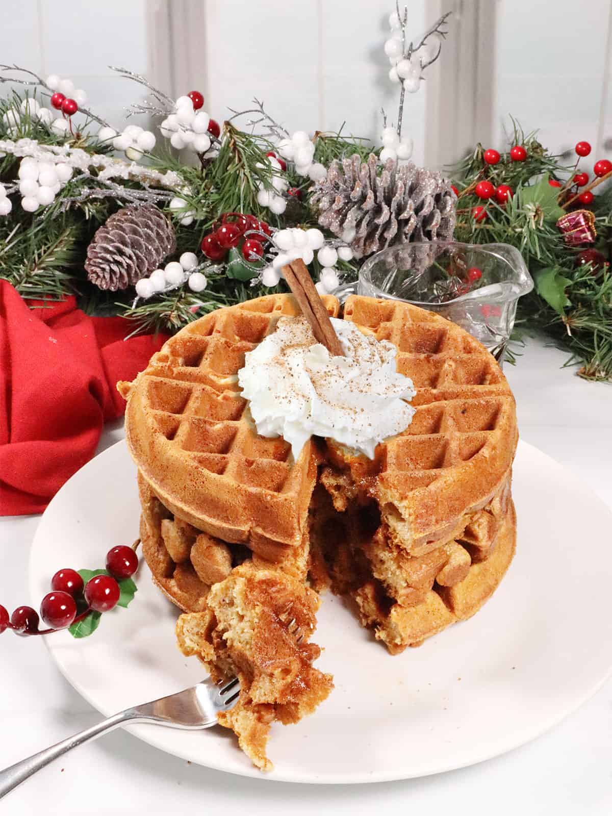 Bite of waffle on fork.