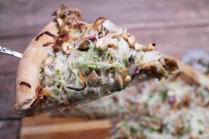 Thai Chicken Pizza closeup slice | 2 Cookin Mamas