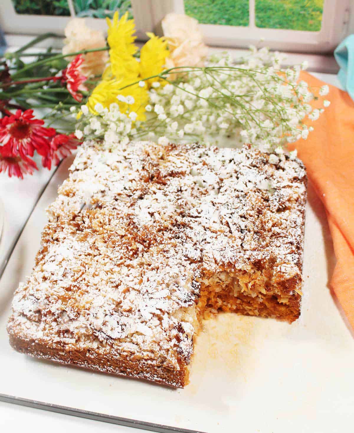 Spice cake with tomato soup with slice out.