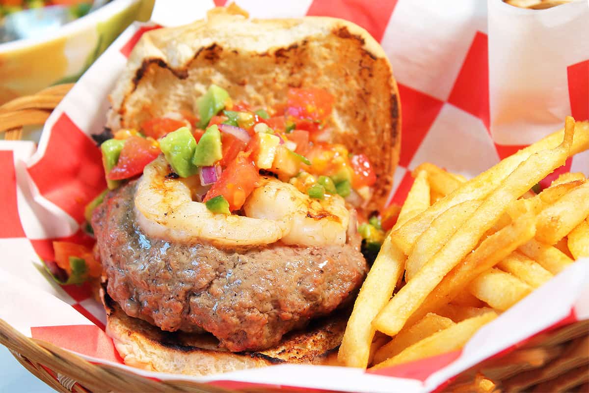 Salsa burger in basket with fries.