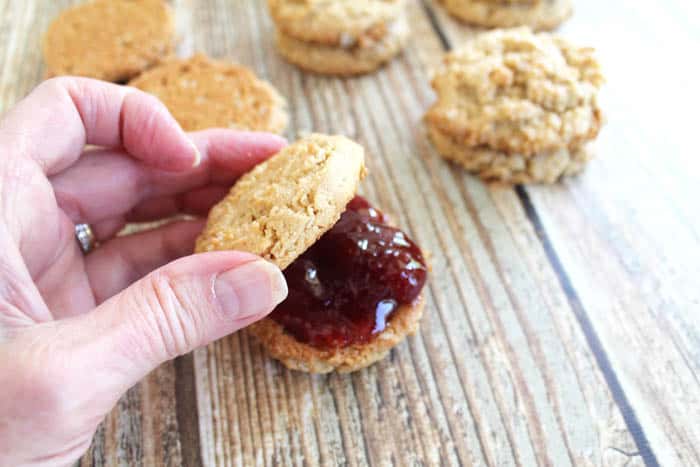 Peanut Butter and Jelly Cookies sandwiching | 2 Cookin Mamas