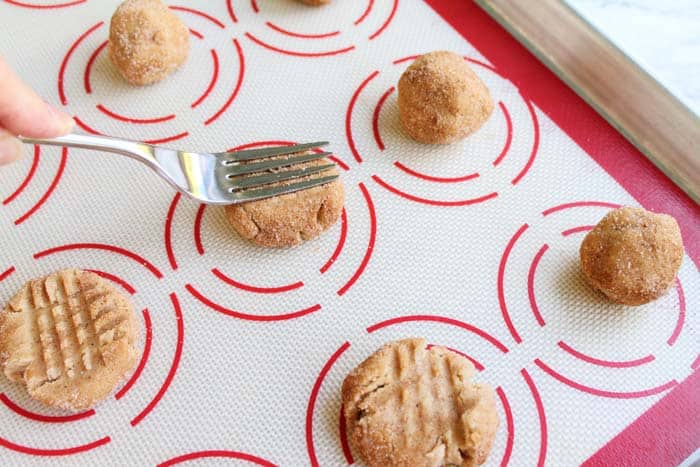 Peanut Butter Snickerdoodles press down with fork | 2 Cookin Mamas