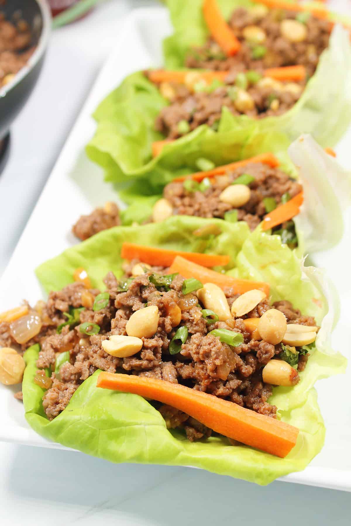 Asian Beef Lettuce Wraps closeup on platter.