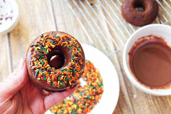 Chocolate Mint Doughnuts dip in sprinkles | 2 Cookin Mamas