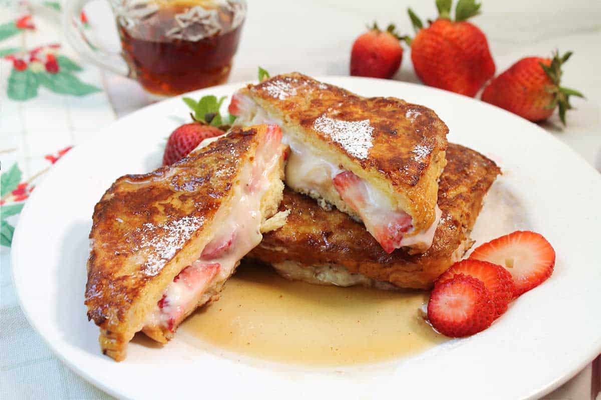 Cut French toast showing inside filling.