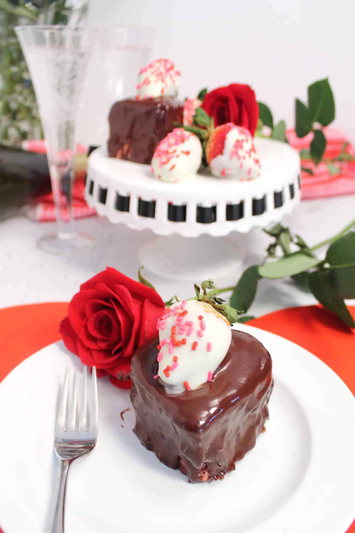 Valentine's Day chocolate covered strawberry mug cake with roses and champagne.