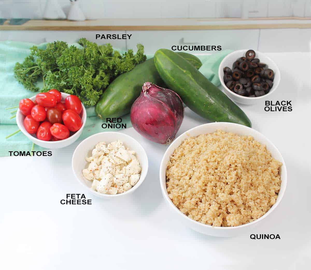Ingredients for Mediterranean quinoa salad recipe.