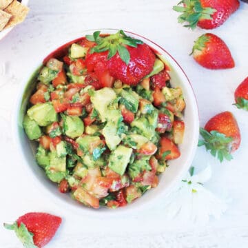 Overhead of Strawberry salsa with avocados in bowl.