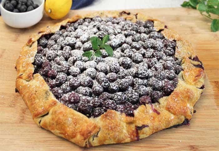 Easy Rustic Blueberry Galette dusted with sugar | 2 Cookin Mamas