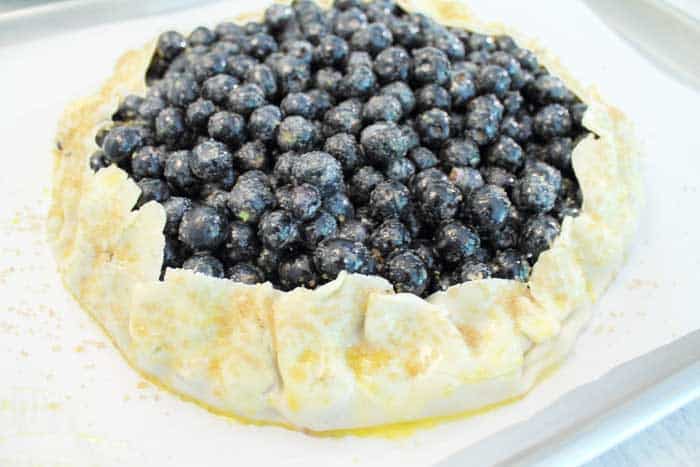 Easy Rustic Blueberry Galette closeup ready to bake | 2 Cookin Mamas